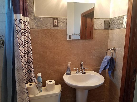 Bathroom, with new tiling in sink area
