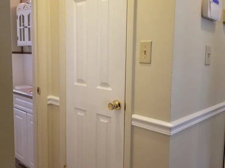 Linen closet leading to bathroom.