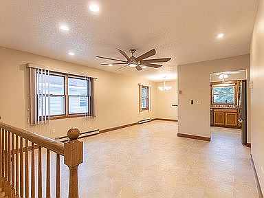 Living, dining, kitchen; vinyl plank flooring