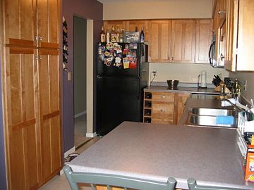 To kitchen from dining room
