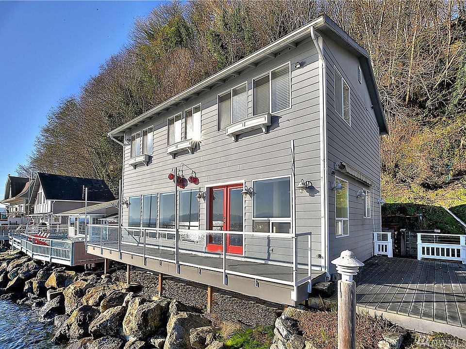 Charming two story home on Sunrise Beach featuring 47' +/- waterfront.
