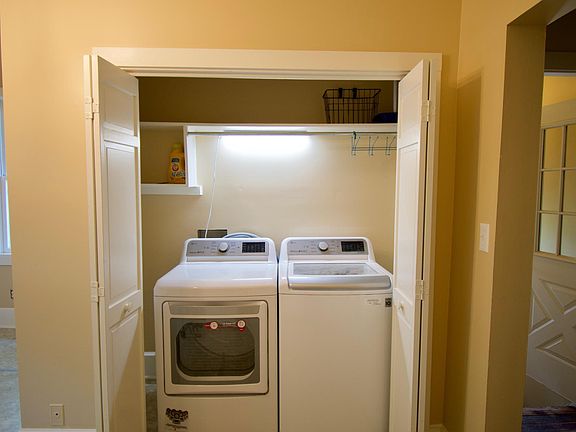 Laundry closet with new washer & dryer