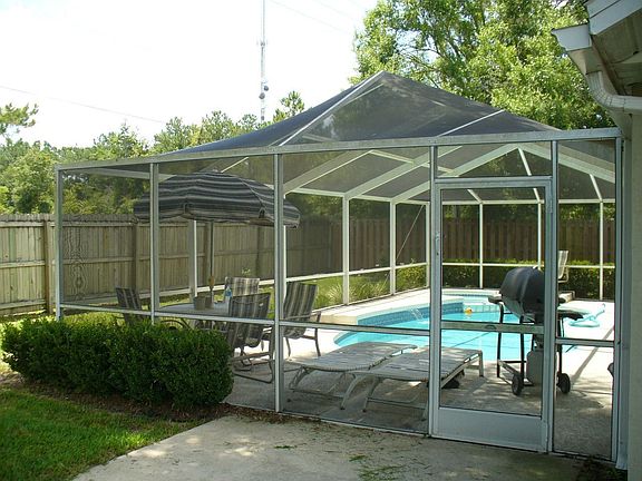 Screen Porch with Heated Pool and Hot Tub