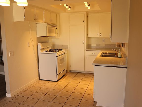 Kitchen with decorative light system. You just add your refrigerator on left