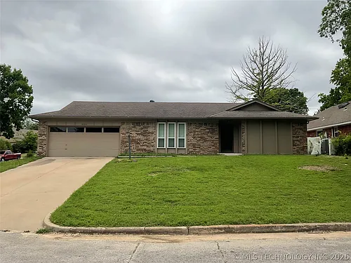 8320 E 56th Pl Photo 1