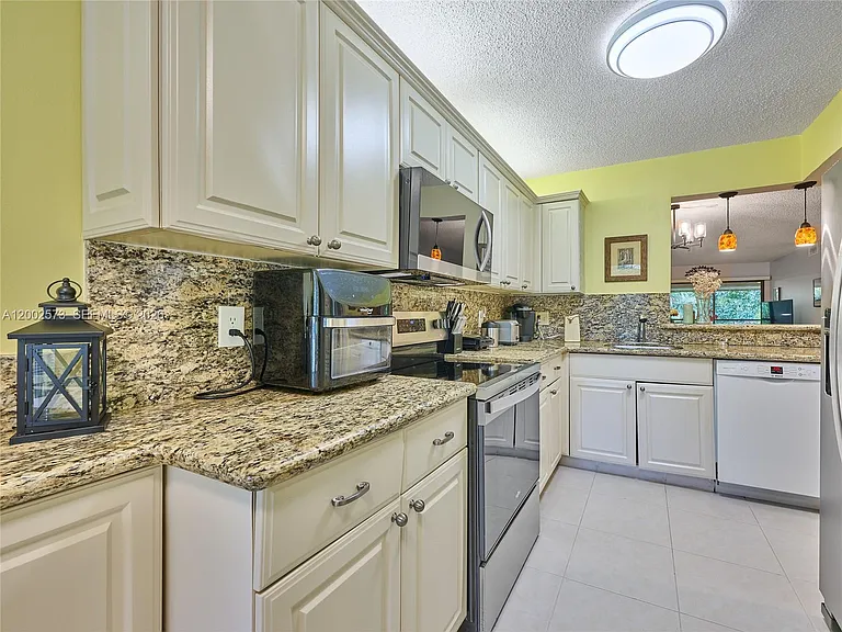 10143 Mangrove Dr #303 — Photo 19