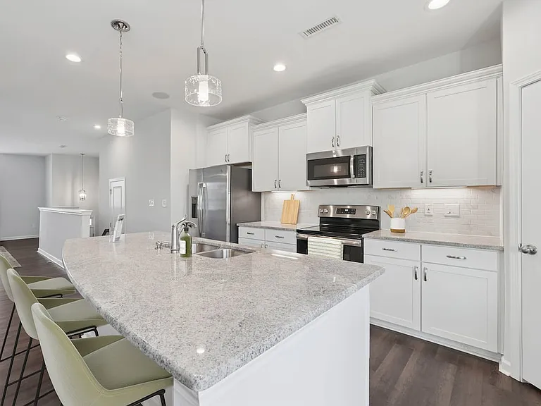 Upgrade Package Kitchen and dining area with hard-surface vinyl plank flooring