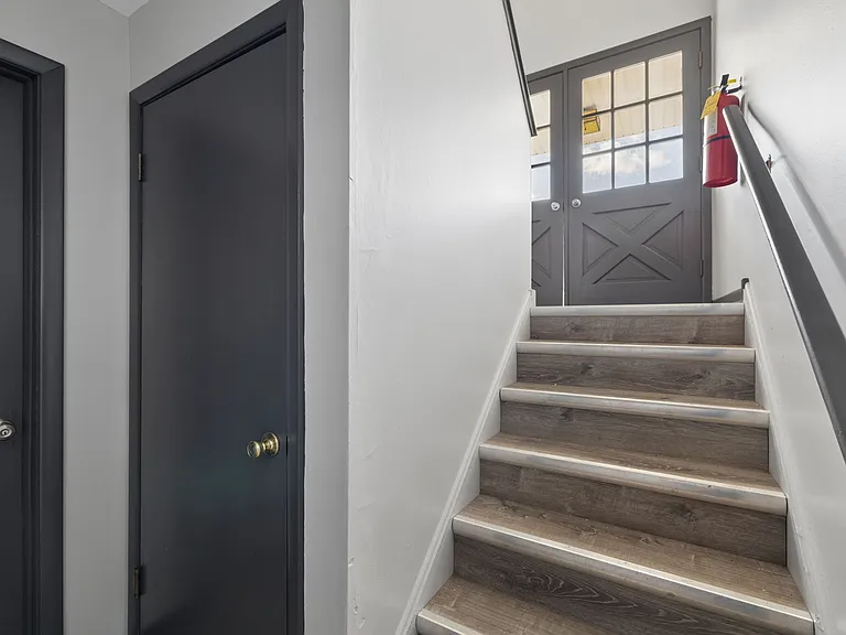 FRONT ENTRANCE FROM DOWN STAIRS