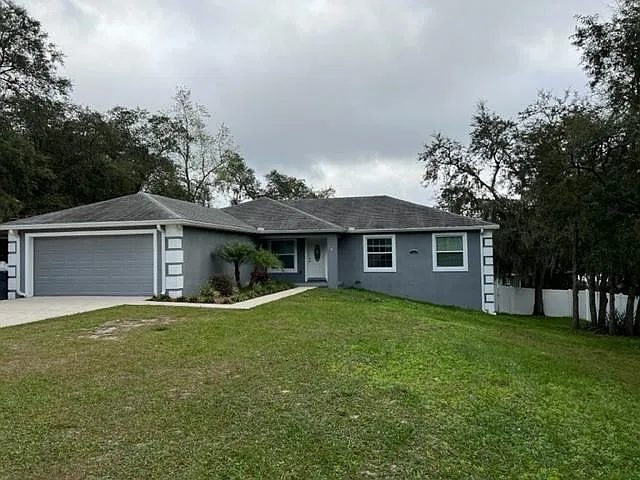 7013 Odoniel Loop W — Photo 1