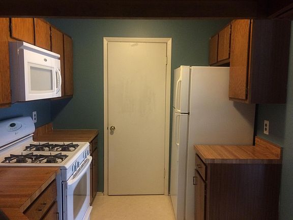 Kitchen with door to laundry