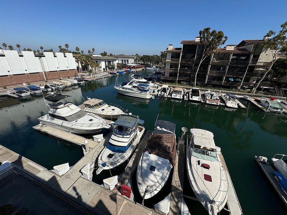 View of picturesque marina from you private top floor balcony!