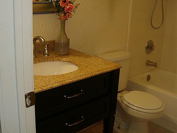  2nd bath has an under mount sink.