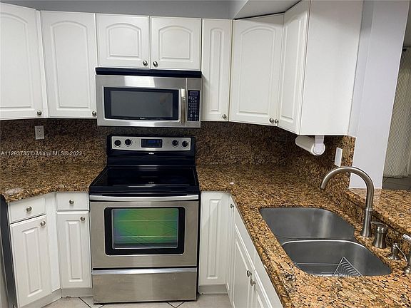 4th image of 9731 NE Fontainebleau Blvd #F109
