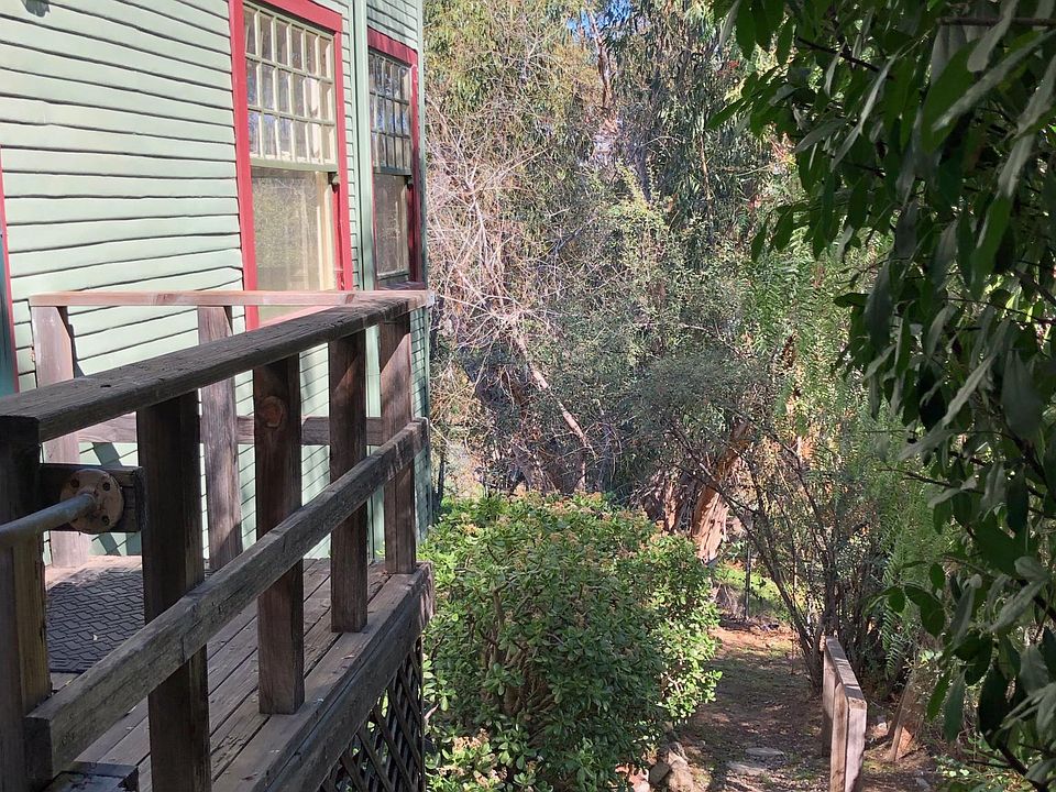 Front door landing and path to backyard