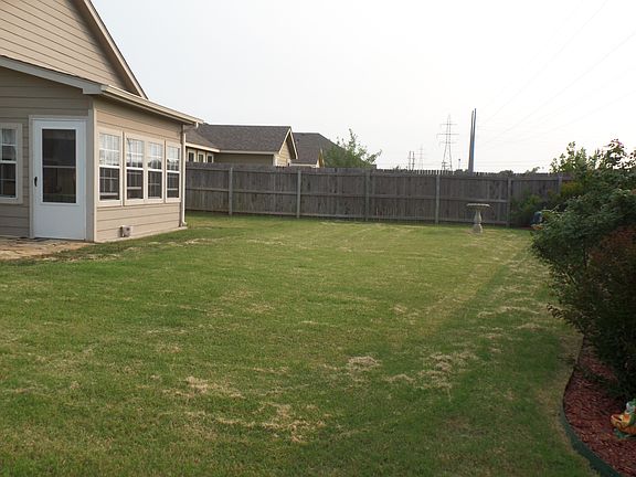 SUN ROOM AND BACK YARD