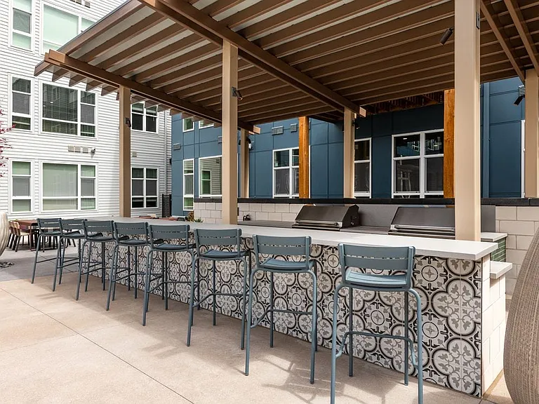 Pool courtyard with grill area