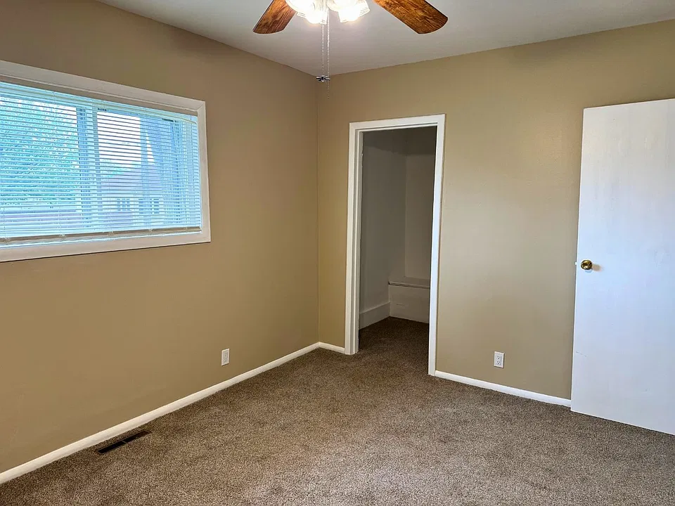 Bedroom 1 - has a ceiling fan and large walk-in closet