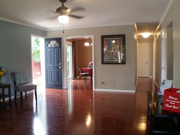 GLEAMING FLOORS THROUGHOUT.