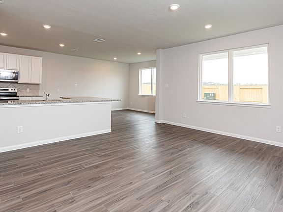 Family Room to Kitchen and Dining Area