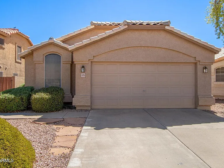 Front Of Home 2 Car Garage and plenty of parking.