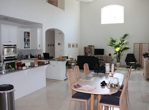 Spacious two-story family room, kitchen with center isle and breakfast area