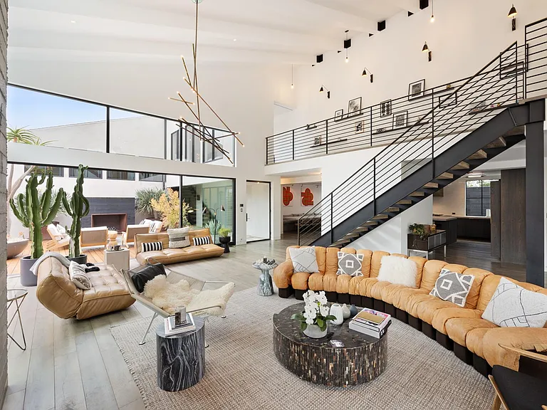 Stylish touches and a tall ceiling create the perfect atmosphere.