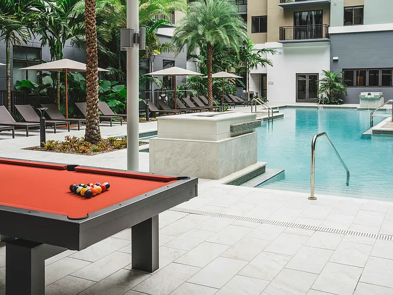 Play pool by the pool and enjoy the perfect blend of relaxation and recreation.
