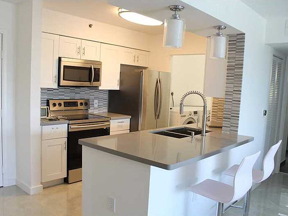 3rd image of 19901 E Country Club Dr #2603
