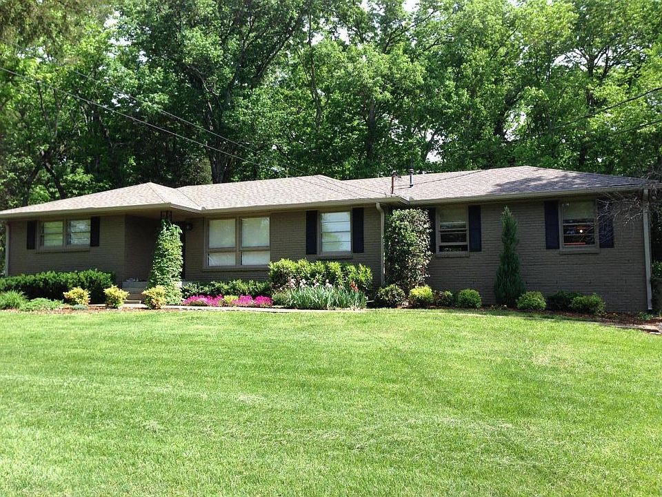 Spring Time View pf Front. Lawn Maintenance is included. See later pics for fall view of front of house.