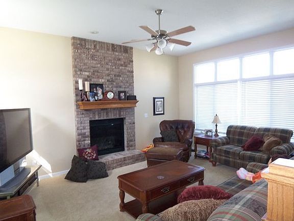 Living Room with Brick Fireplace