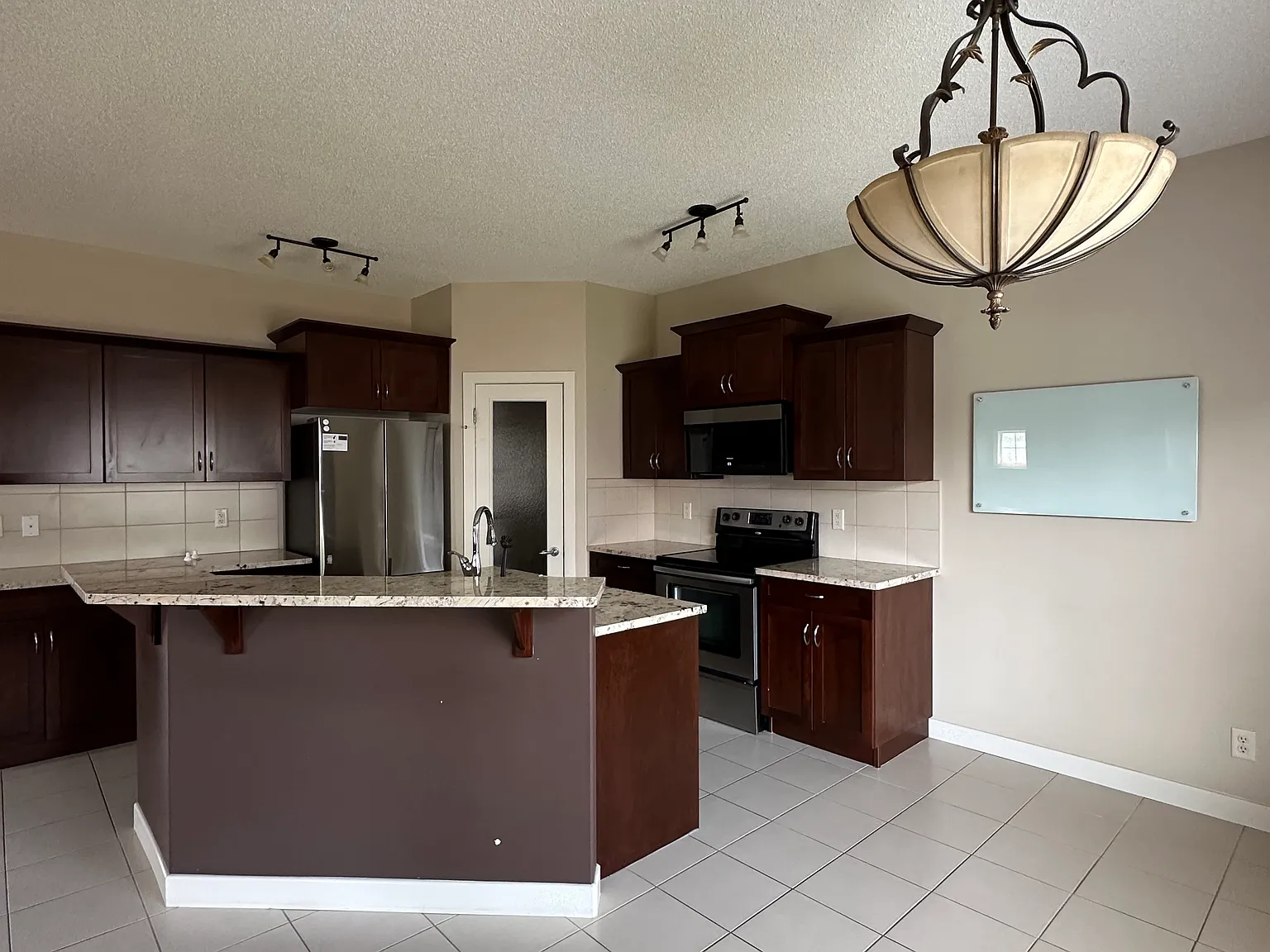 Luxstone Blvd SW, Airdrie — Photo 4