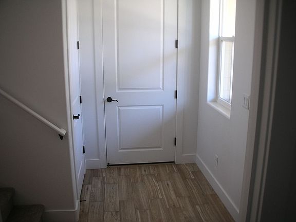 Entry and door to garage