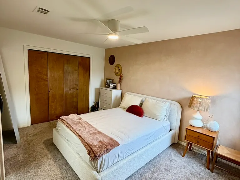 Second floor bedroom with queen bed and full closet