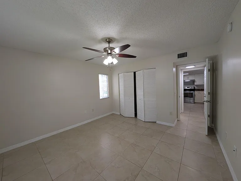 5011 Wiles Rd #208 — Photo 11