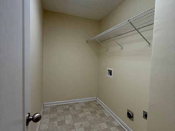 Washing machine and dryer area.