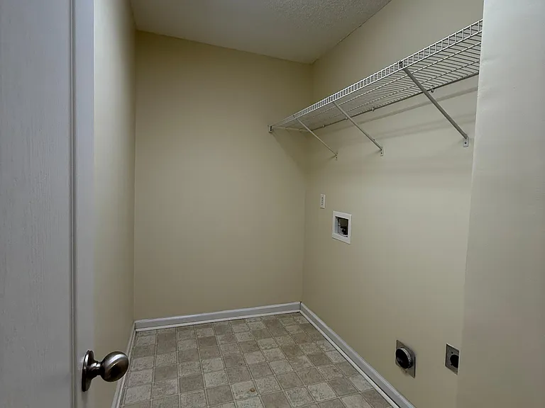 Washing machine and dryer area.