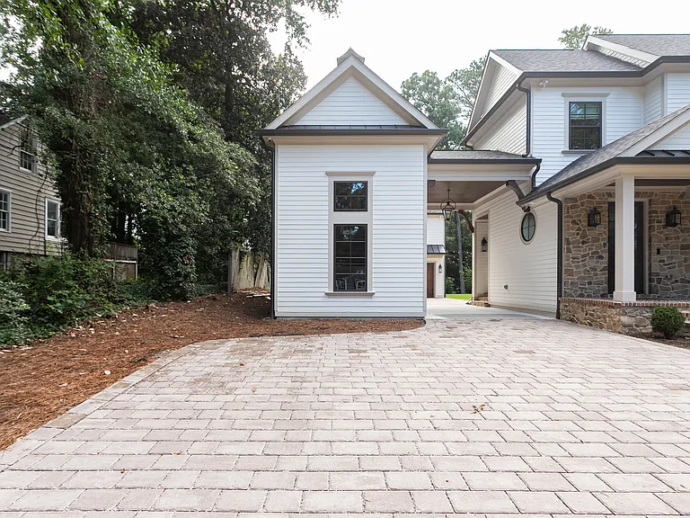 1 dedicated uncovered parking space in front of single car garage (street parking available)