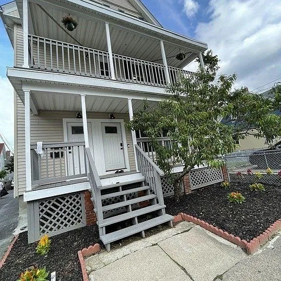 Ground floor unit, door to the right