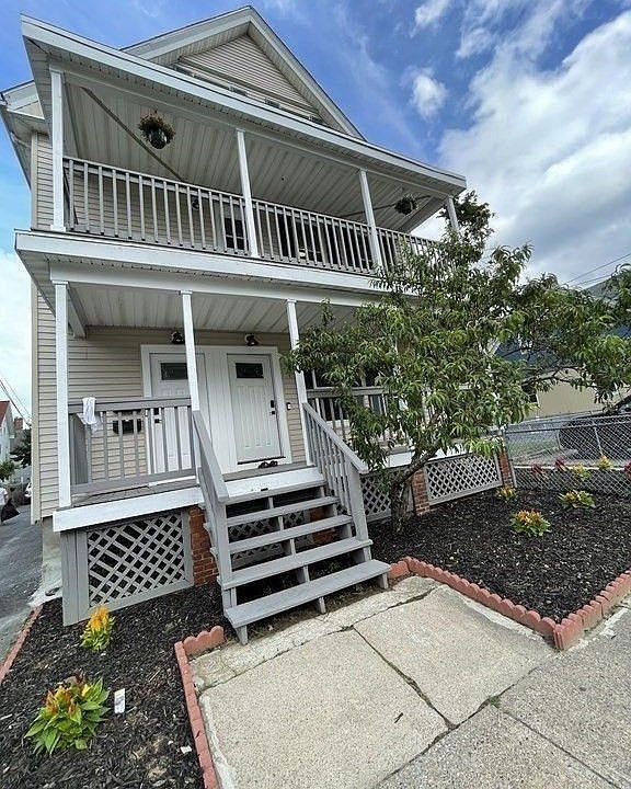 Ground floor unit, door to the right