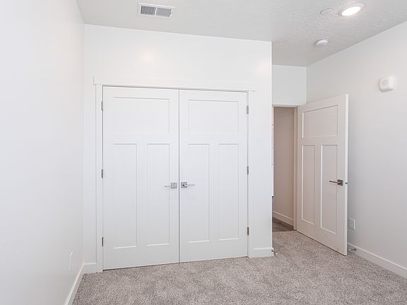 Three Bedroom - One of three bedrooms