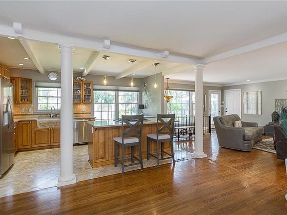 Open concept kitchen and family room welcome you as you enter through the front door!