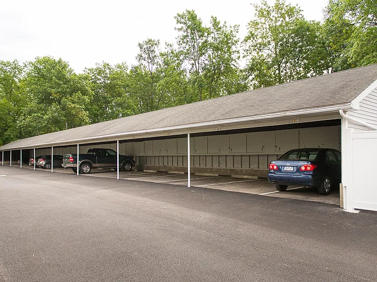 View of carports available in addition to off-street parking