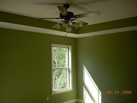 Rich artichoke paint with ivory trim