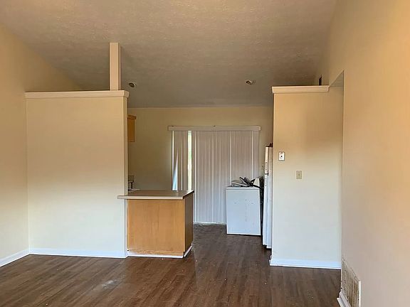living room into kitchen