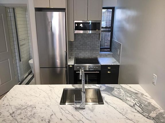 2nd image of 59 E 3rd St APT 5A