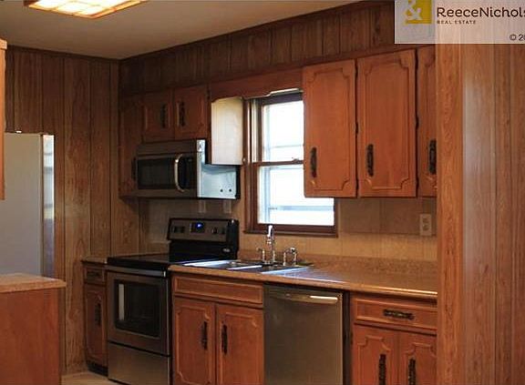 All stainless steel appliances are newer and refrigerator also stays.