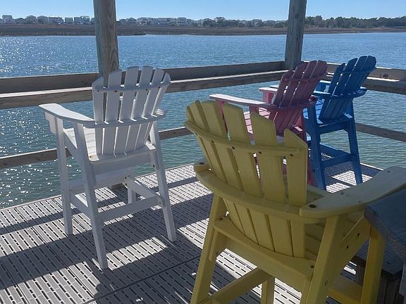COVERED AREA OF THE OIER. SIT AND WATCH FOR BOATS, DOLPHINS OR JUST READ. YOU CAN FISH OR CRAB FROM THIS AREA.