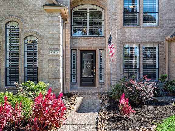 The 4.5" plantation shutters bring added curb appeal to this already fabulous home.