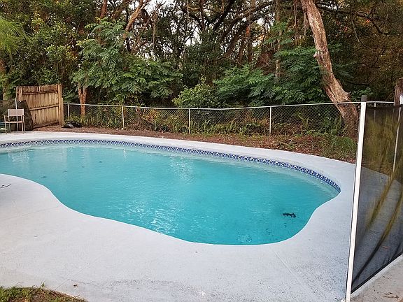 Pool with empty side lot