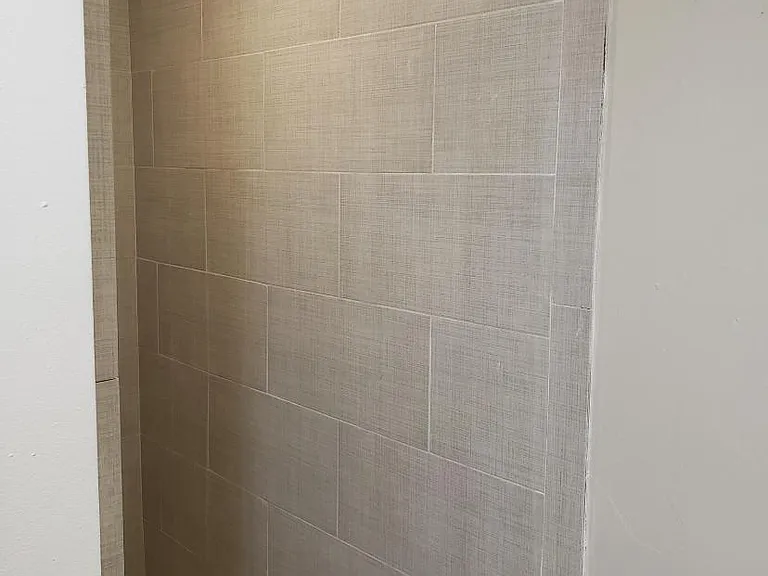 Master shower new tile